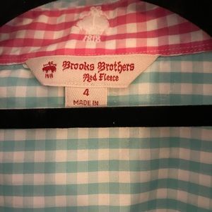 Brooks Brothers woman’s shirts , not perfect condition has a small stain .